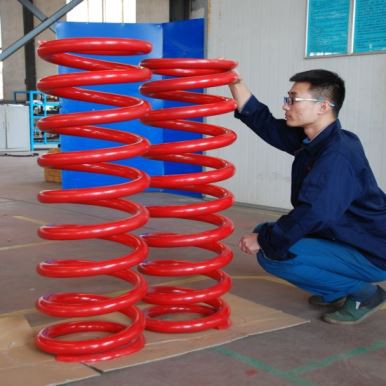 Rautatieliikenteen puristusjousi